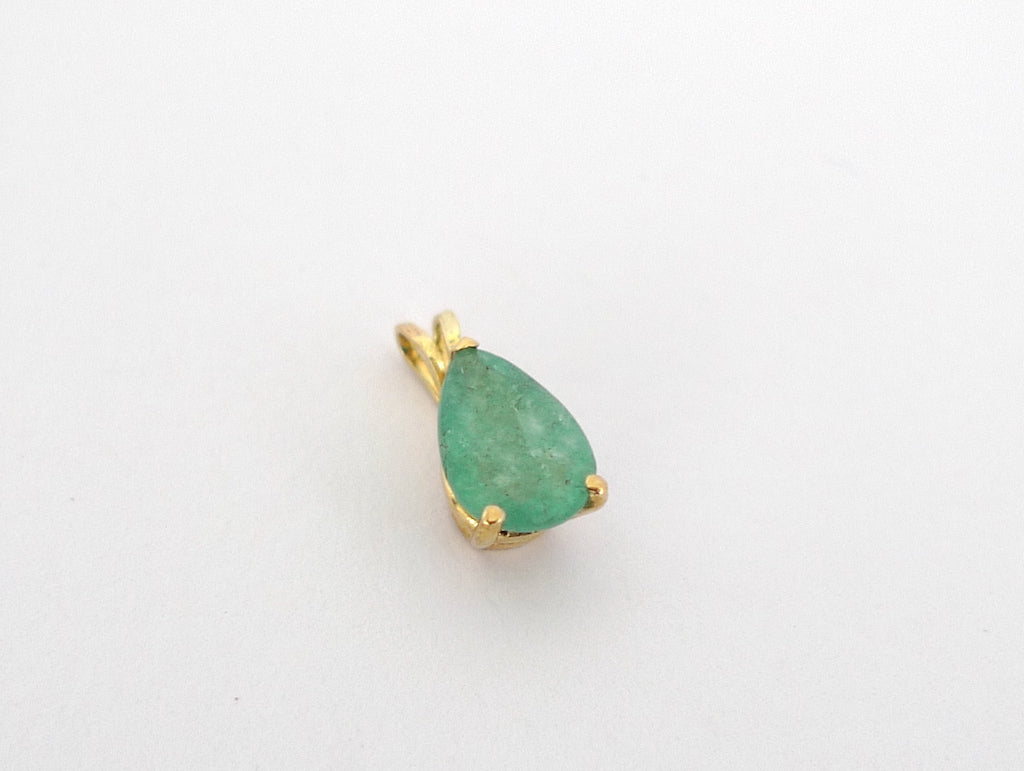 pear shape cut emerald gemstone set in 14k solid gold basket bezel with bail to hang on a chain