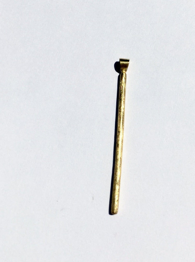 smooth long line of solid 18k gold with bail to fit many gold chains rough rustic textured antique design