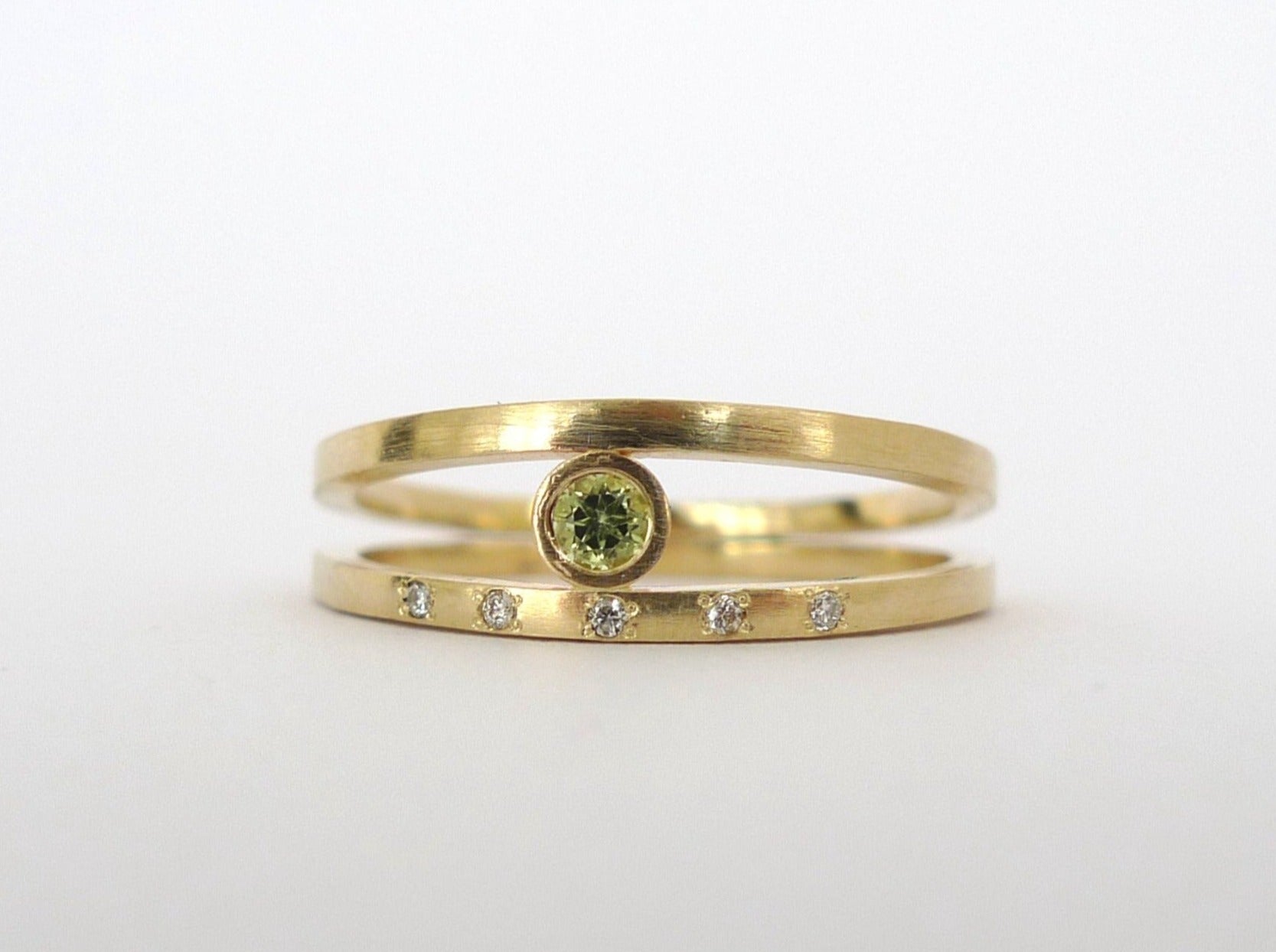 unique design open split gold modern ring set with brilliant cut green peridot plus 5 brilliant cut diamonds in square double open 14k recycled gold ring