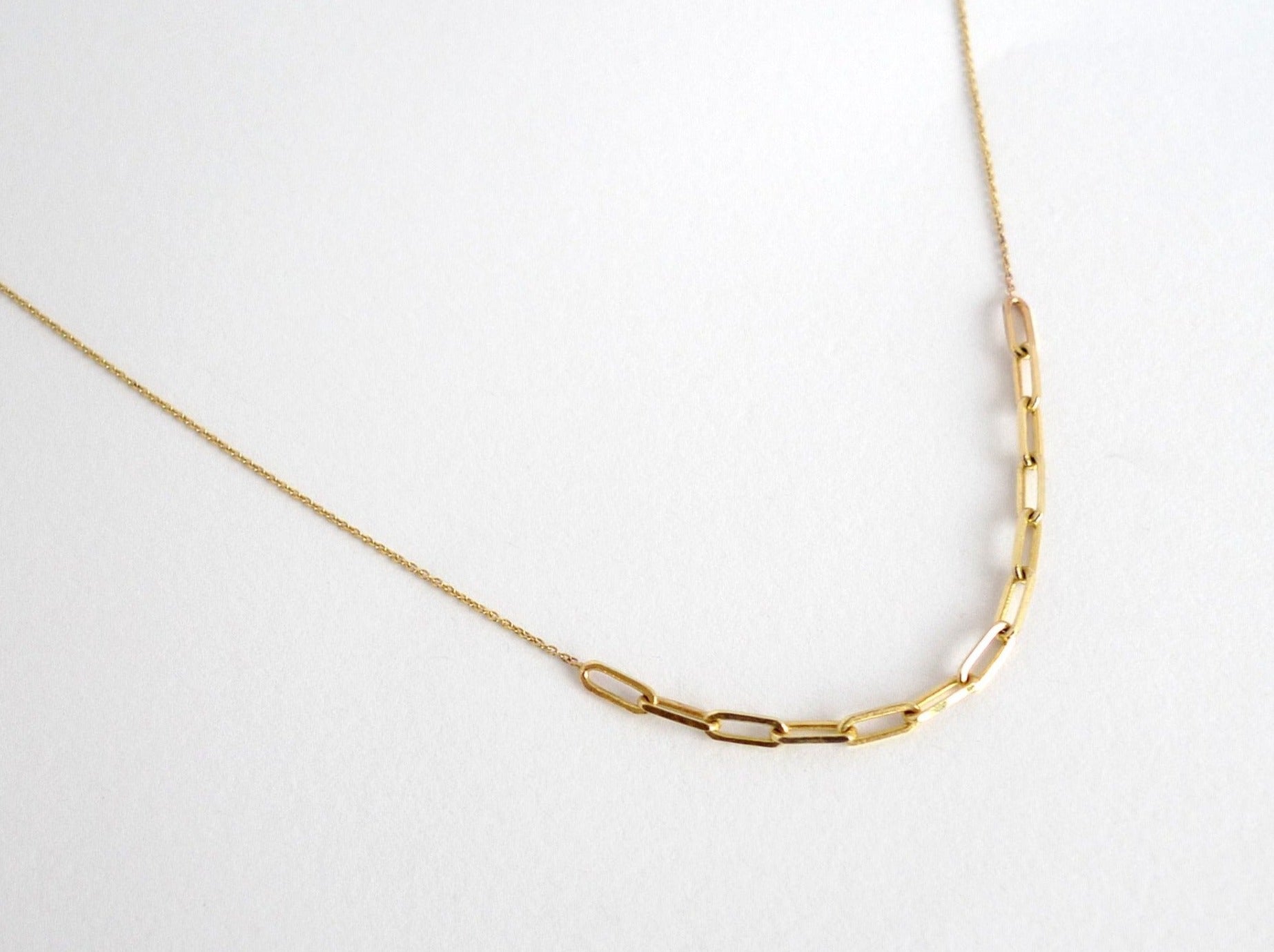 asymmetric 14k solid gold paperclips chain rectangle links chain in gold nested in tiny links chain layered links in different shapes and sizes
