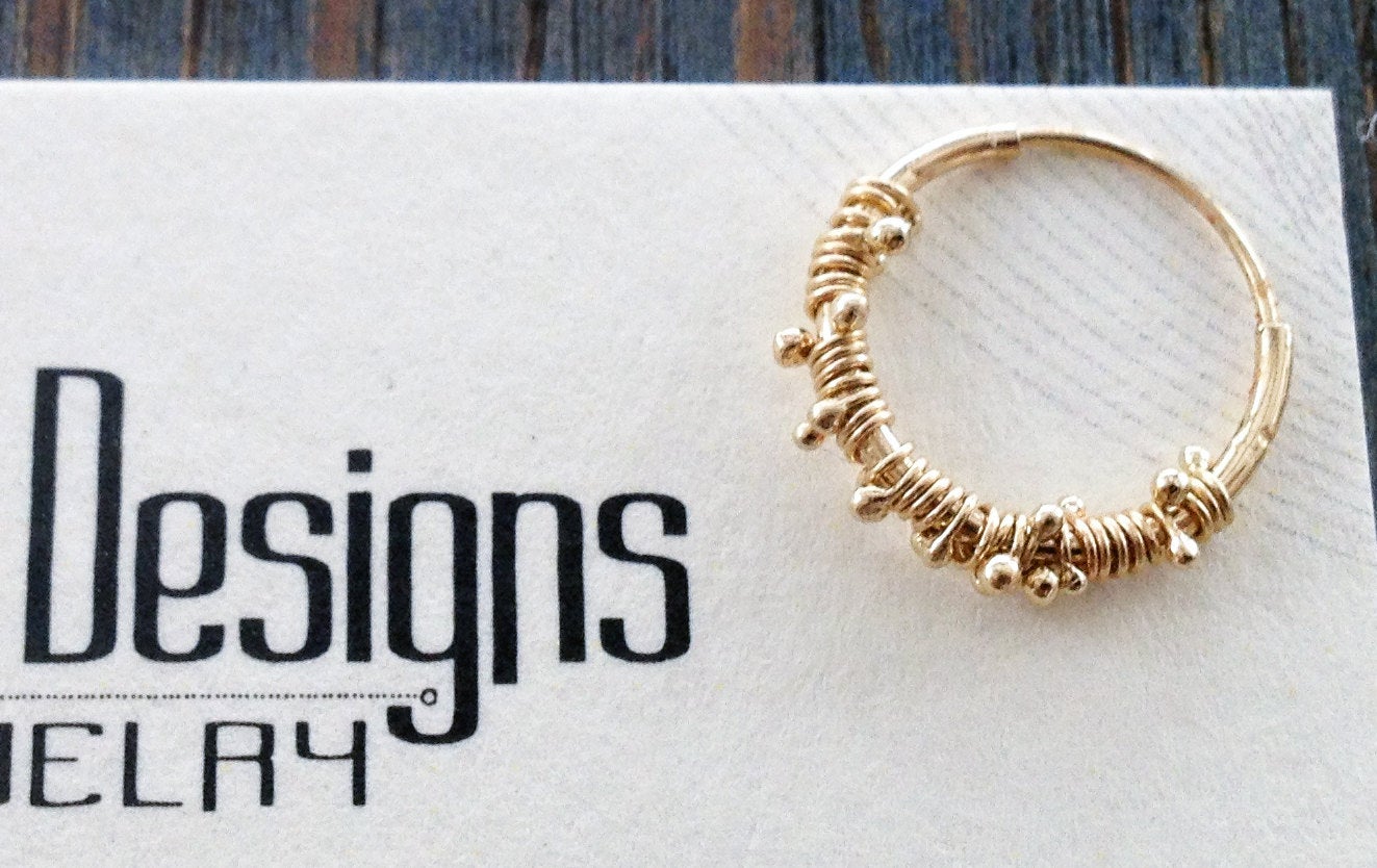 עגיל נזם הליקס ספטום זהב אמיתי 14 קרט עבודת יד חוט מלופף עגיל חישוק לאף טראגוס תכשיטי גוף מעצבים ישראלים תכשיטים אונליין