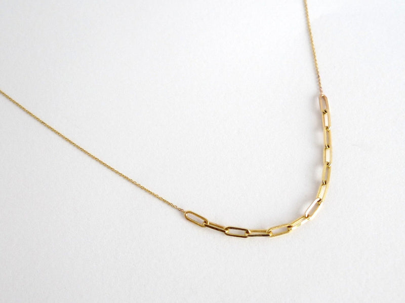 asymmetric 14k solid gold paperclips chain rectangle links chain in gold nested in tiny links chain layered links in different shapes and sizes