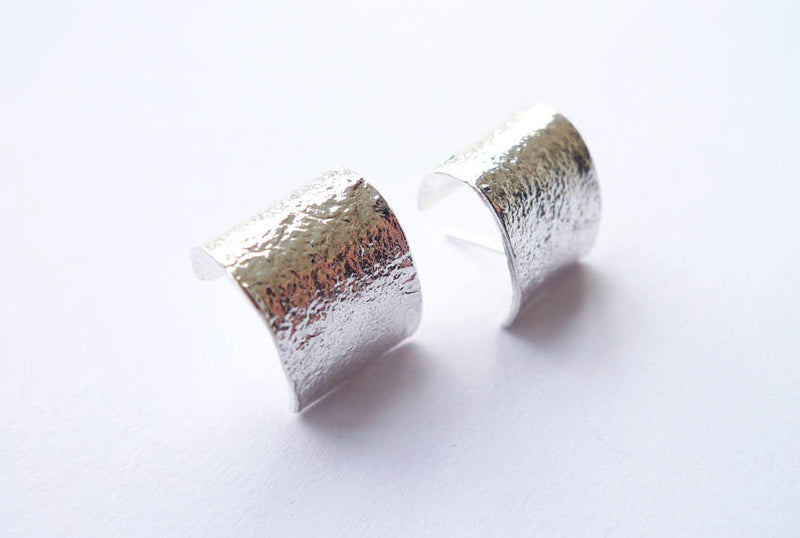 rustic textured ice inspired ear hugger sterling silver shiny earrings
