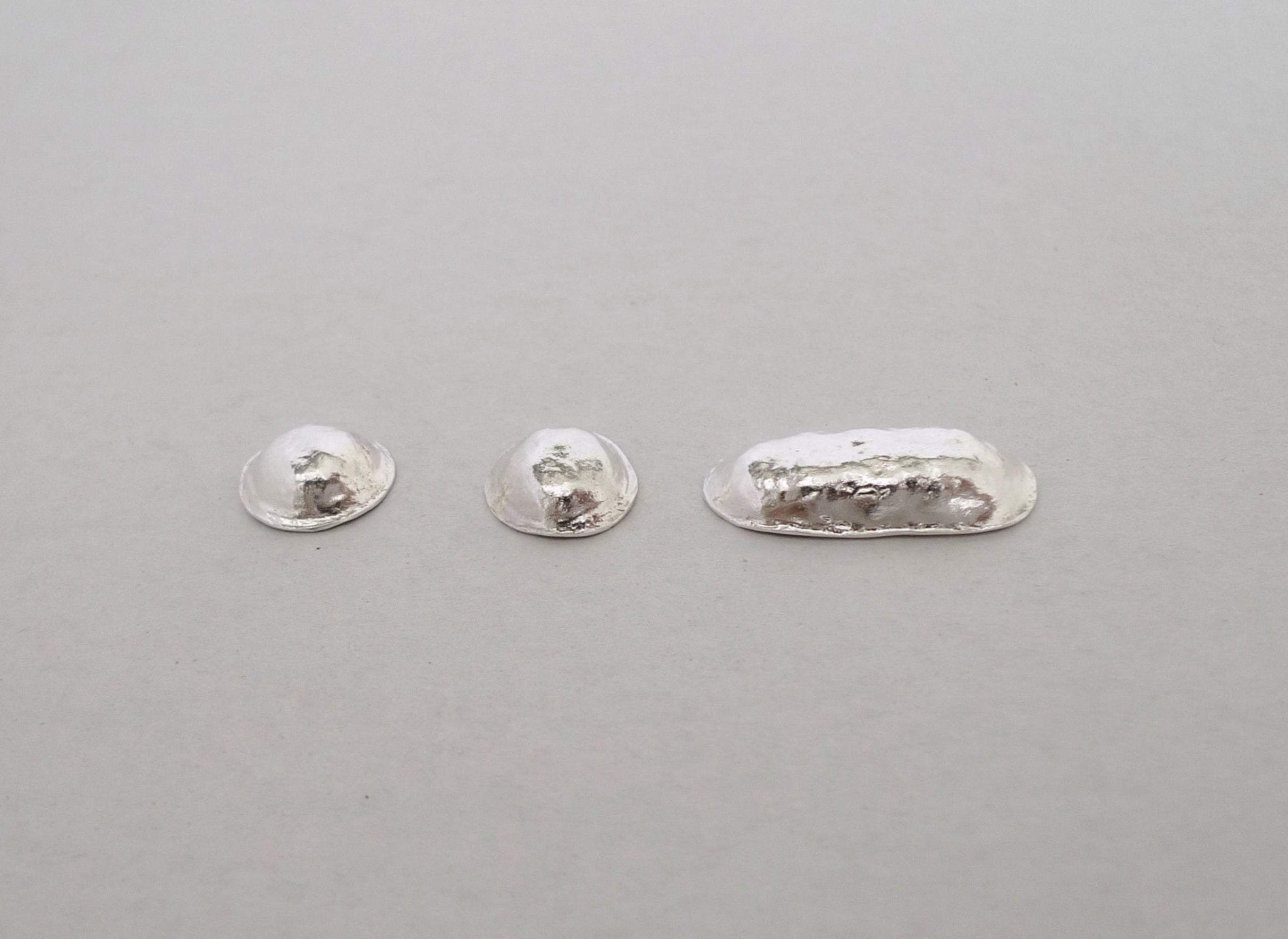 handcrafted sterling silver puffed organic uneven shapes of line or dot for personal design on your garment. Exclamation point  and vice versa stylish rugged rustic shiny stylish mix and match lapel pins. morse code message 