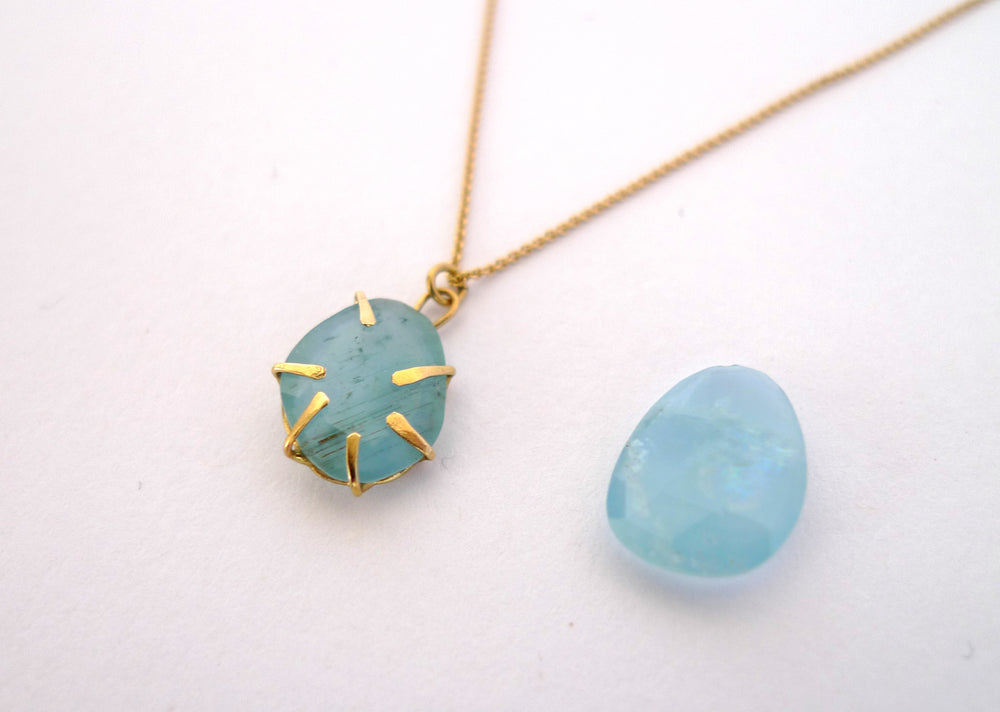 handmade 14k solid gold basket pendant wrapping light blue aquamarine slice faceted gemstone