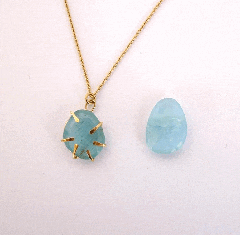 Aquamarine Wrapped In Gold