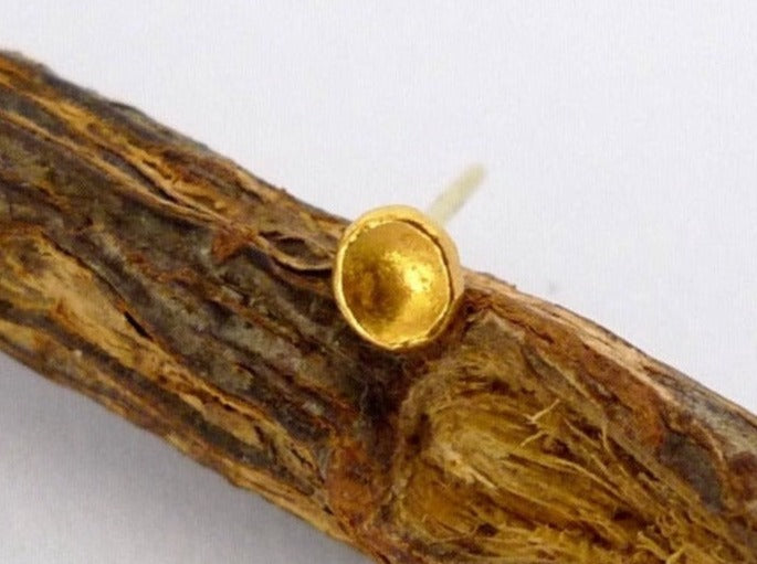 solid 24k gold stud earring handmade mini bowl shape primitive design inspired by antique jewelry gold essentials asymmetric mix and match tiny hammered concave earring 
