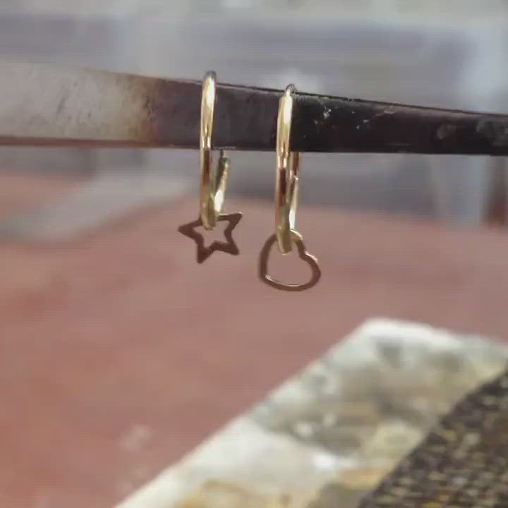 gold endless hoop earrings with Star or heart elements