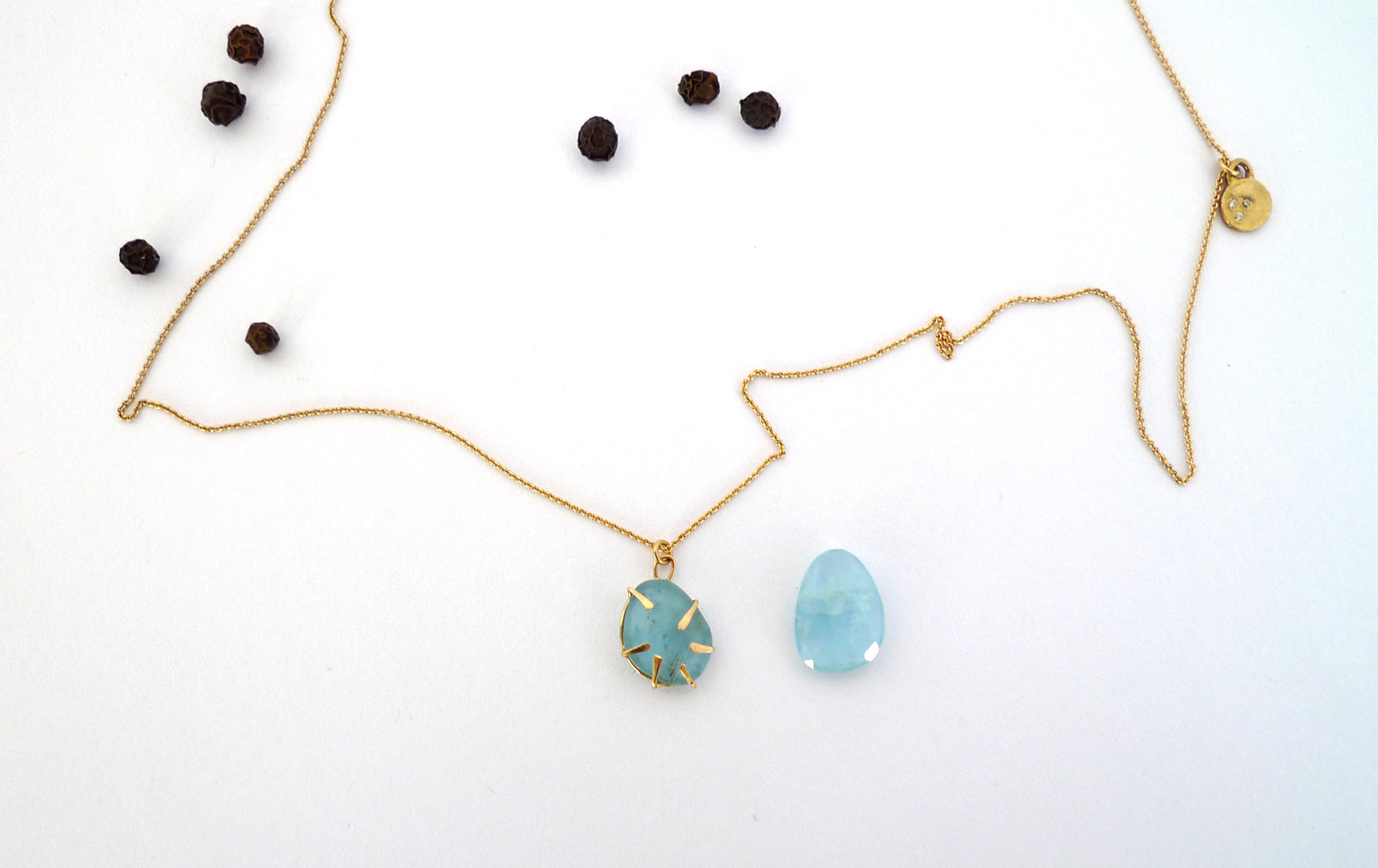 Aquamarine Wrapped In Gold
