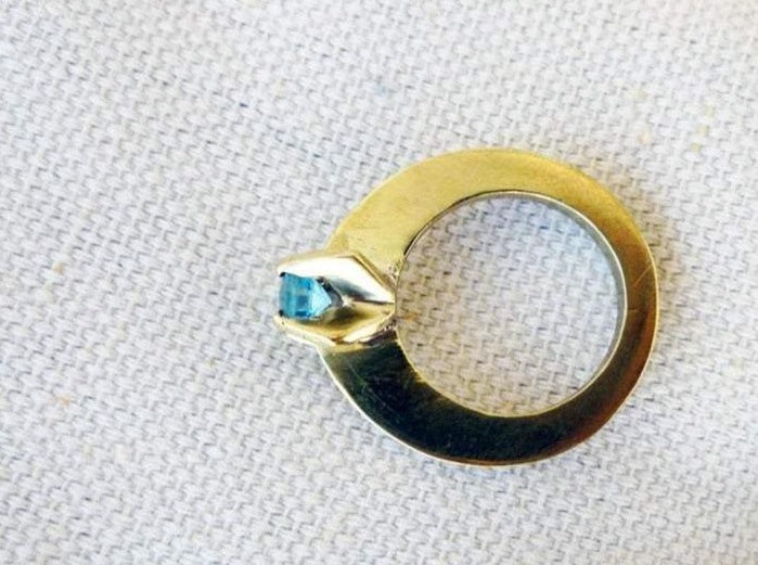 alternative modern engagement ring side view statement yellow gold ring