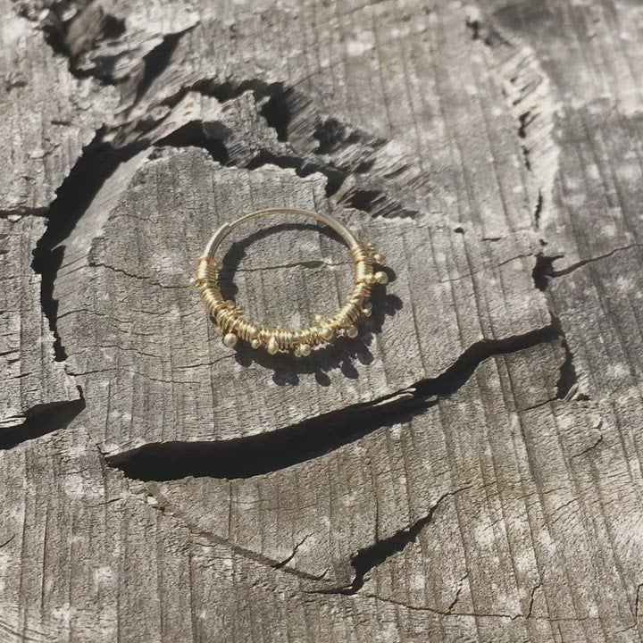 Joy Earring 14k gold endless hoop with handmade dainty wrapped bulbed solid gold wires around