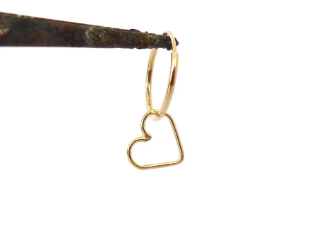 dangle heart hoop earring open heart gold 14 karat handmade recycled gold heart charm hanging on a gold hoop earring