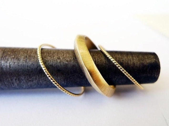 eclipse ring set knife edge rustic unpolished brushed gold ring and 2 ultra thin braided gold rings as side enhancers
