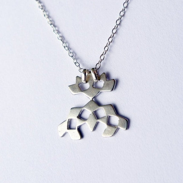 dainty modern alternative geometrical cutout mashrabiya mini pendant necklace sterling silver handmade contemporary